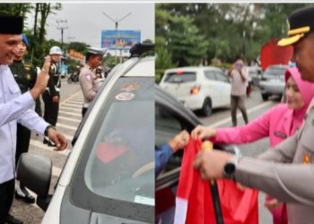 Bupati Sarolangun H.Hurmin Bersama dengan Kapolres dan Forkompinda Bagikan Bendera Merah Putih untuk Pengguna Jalan