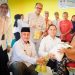 Wabup Gerry Salurkan Bantuan Pangan Bapanas untuk Korban Banjir di Bathin VIII Sarolangun